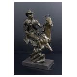Armed Cowboy on Horseback Bronze