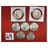 7) 1964 Kennedy Half Dollars