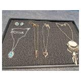 4 Necklaces one with matching earrings