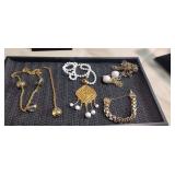 3 Necklaces and a bracelet