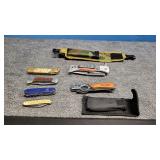 4 pocket knives and 2 Switch blade knives