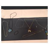 6 Necklaces, Bracelet & Small Crystal