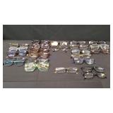 24) Pairs of Reading Glasses Various Strengths