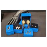 1) Pendant 1) Bracelet 4) Earrings