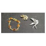Bracelet and Two Brooches
