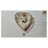 Porcelain Baby Doll In Handcrafted Wicker Cradle