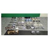 27)  Pair of Reading Glasses
