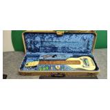 Clo-Clove Case Regal Electric Guitar needs strings