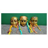 Three Decorative Brass Wall Masks