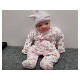 Realistic baby doll with blue eyes