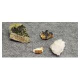 Four pieces of raw mineral stones