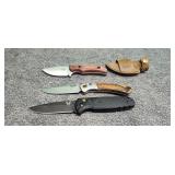 Two folding pocket knives one with sheath