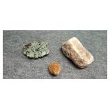 Three raw mineral stones