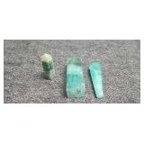 Three pieces of carved/polished mineral crystals