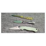 Two folding pocket knives and a fantasy plastic