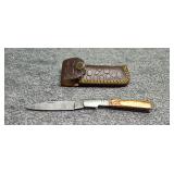 Three and a half inch folding knife with sheath