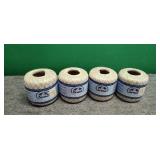 Four rolls of crochet thread