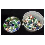 Bucket of various marbles.