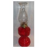 Vintage ruby red glass oil lamp.