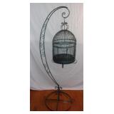 Vintage wrought iron bird cage & stand.