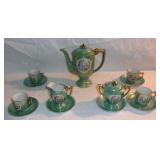 Vintage lusterware demitasse set.
