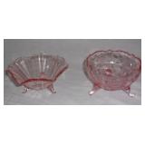 Pink depression glass footed bowls.