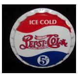 Pepsi-Cola bottle cap sign.