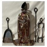 Art deco cast iron knight fireplace companion.