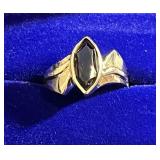 Ladies 10k gold smokey topaz dinner ring.