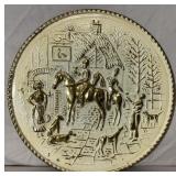 Vintage embossed brass wall plate.