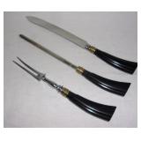 Stainless steel carving set.