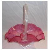 Vintage Fenton cranberry glass basket.