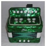 Vintage Fiore child's accordion.