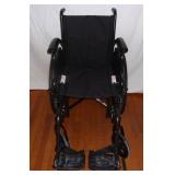 Lightweight folding wheelchair.
