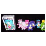 Care Bear plush toys.