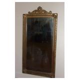 Antique wooden framed wall mirror.