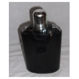 Vintage flask w/ leather cover.