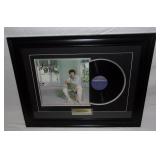 Lionel Richie shadow box.