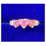 Ladies 10k gold ring w/ topaz & diamonds.