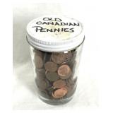 Jar of vintage Canadian pennies.