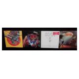 AC/DC & Judas Priest LP records.