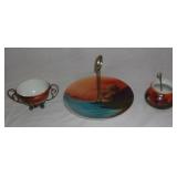 Vintage hand-painted serving pieces.