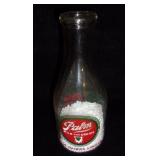 Vintage Palm Dairies milk bottle.