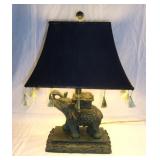 Resin elephant table lamp.