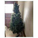 5.5ï¿½ artificial lighted Christmas tree and stand