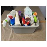 Tote of cleaning supplies