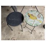 Two small outdoor tables