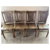 set of four wooden chairs