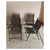 Four outdoor lawn chairs