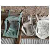 Five plastic outdoor chairs